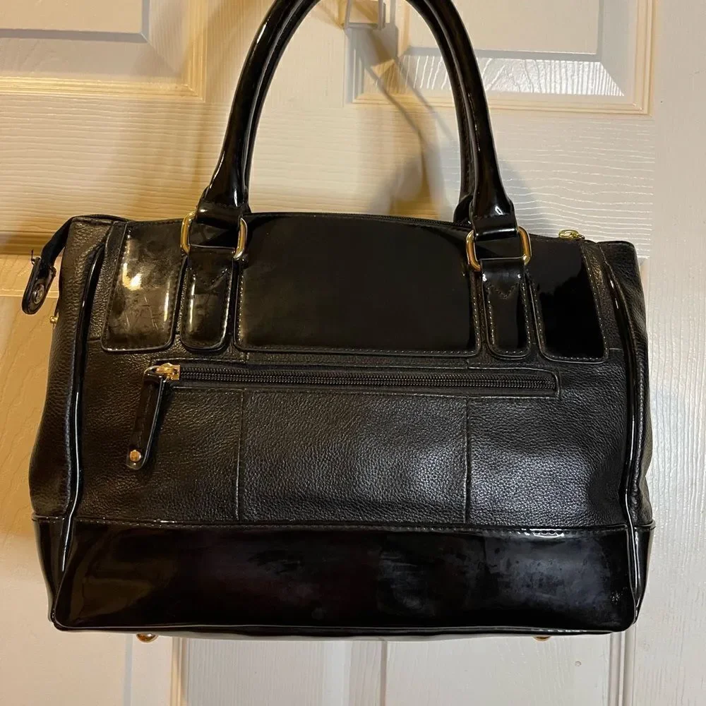 Tignanello black leather shoulder bag with gold tone hardwares